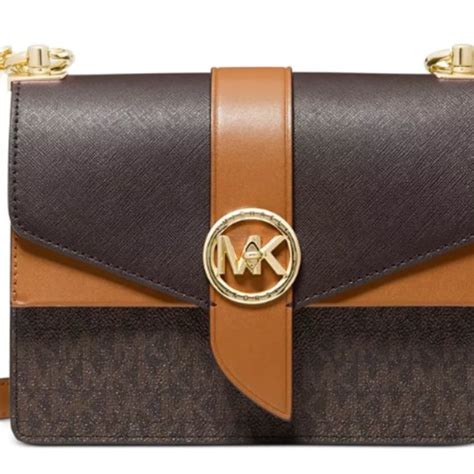 replika michael kors|Michael Kors purse logo.